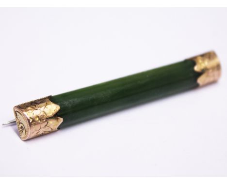 A Victorian 9ct gold mounted jade brooch, length 5.5cm