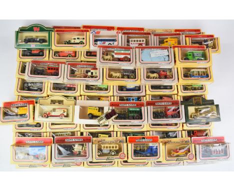 Seventy five Lledo Days Gone diecast model vehicles to include World Collectors Club Series 1st and 2nd gold editions, all in