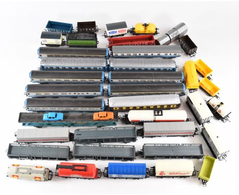 00 gauge model railway rolling stock comprising coaches, wagons and an LNER locomotive tender, mostly Lima