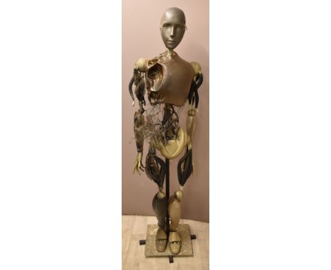 I, Robot (2004) full-sized film prop battle damaged NS-5 robot on metal stand, height 183cm, together with a signed photo and