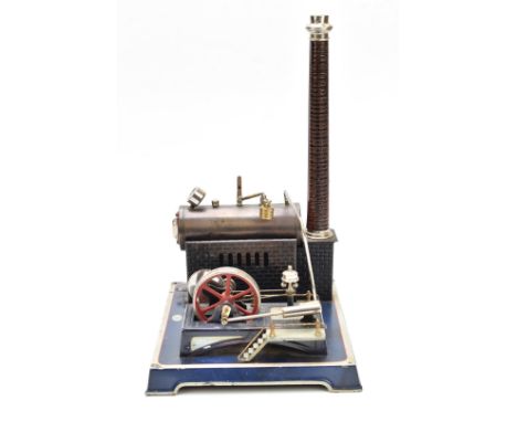 Doll and Cie stationary live steam engine, the boiler with faux brickwork base and chimney, the oscillating engine having dum