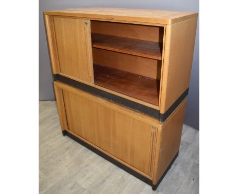 Two Gordon Russell of Broadway light oak tambour fronted cupboards, W120 x&nbsp; D50 x H70cm