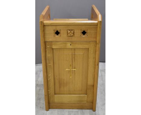 Arts &amp; Crafts style light oak lectern with carved decoration and cabinet to back, H116 x W62 x D68cm