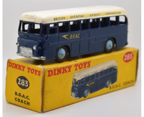 Dinky Toys diecast model BOAC Coach with dark blue body, white roof and pale blue hubs, 283, in original box.