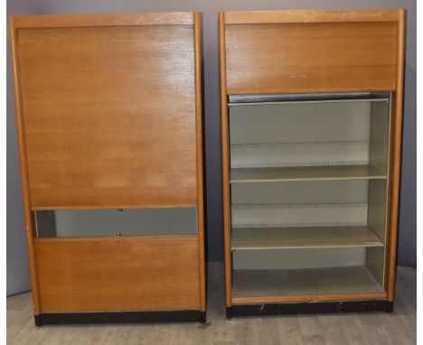 Two Gordon Russell of Broadway light oak tambour fronted cupboards, with metal linings for adjustable shelves, W102 x&nbsp; D