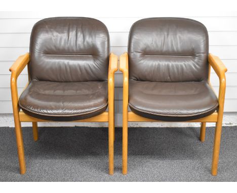 Four Kusch+Co. light oak, leather upholstered armchairs, please note the photograph shows an example chair