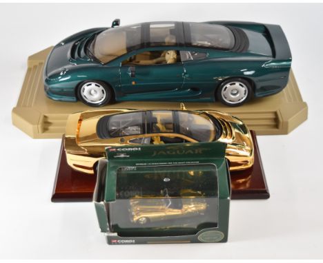 Three diecast model Jaguars comprising Corgi Classics Gold Plated Jaguar XK120 02903, Maisto Gold Plated XJ220 and a 1:12 sca