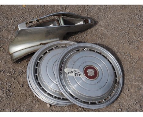4- Cadillac wheel trims and light cluster 