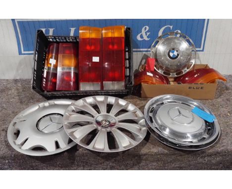 Assorted rear car lights to include BMW and Jaguar and wheel trims to include Mercedes and BMW 