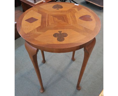 A 20th century mahogany circular occasion table inlaid with card suits to top, 72cm high x 61cm diameter and another carved o