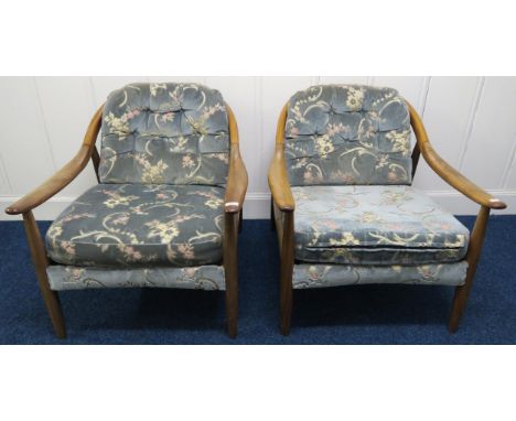 A pair mid 20th century teak framed Greaves &amp; Thomas stick back armchairs, 72cm high x 70cm wide x 76cm deep (2) Conditio