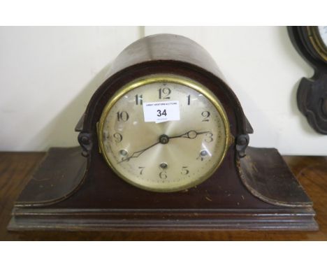 A 20th century mahogany cased mantle clock and an oak barometer/thermometer (2) Condition Report:Available upon request
