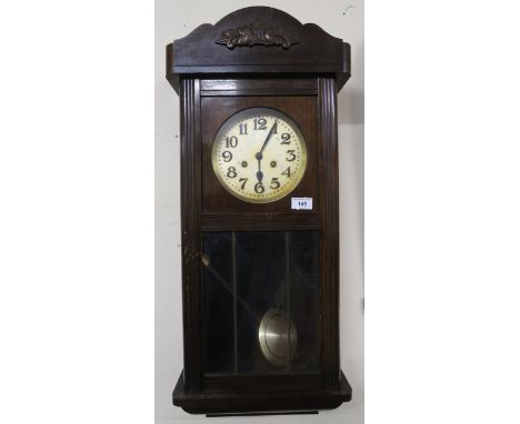 A 20th century mahogany wall clock, an early 20th century oak cased mantle clock and tow further mahogany mantle clocks (4) C