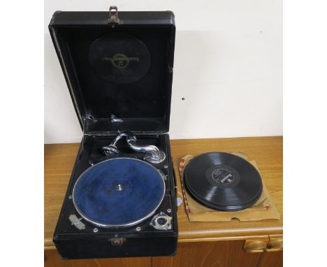 A Columbia portable gramophone and a bag of assorted records&nbsp; Condition Report:Available upon request