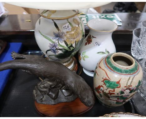 A Tom Mackie resin figure on a swimming otter, a Chinese crackleware vase, a Royal Worcester fruit decorated vase, a floral d