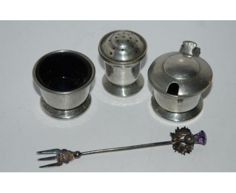 A silver fork, Chester 1913, with thistle finial, Tudric pewter condiment set Condition Report:Available upon request