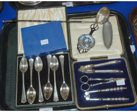 A tray lot of EPNS including toddy ladle, cased spoons etc&nbsp; Condition Report:Available upon request