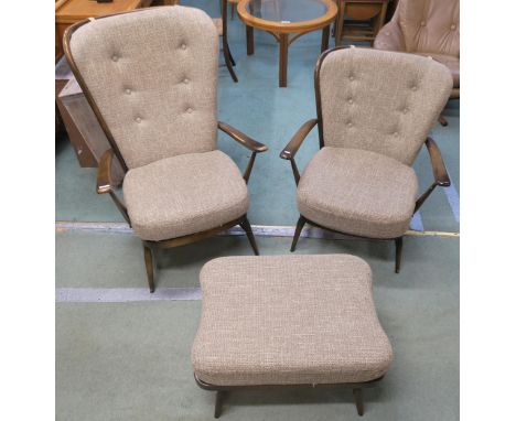 A mid 20th century beech Ercol high back armchair, another Ercol armchair and an Ercol footstool all upholstered in grey wool