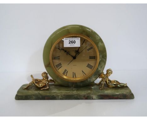 An onyx and gilt mantle clock Condition Report:Available upon request