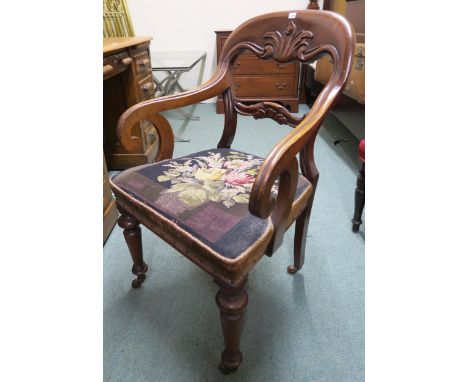 A Victorian mahogany armchair with tapestry seat, painted frame oval wall mirror and a Sorento style inlaid nest of three tab