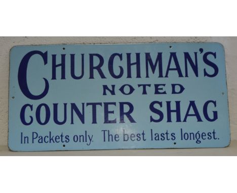 Enamel sign, Churchmans Noted Counter Shag, navy text against sky blue ground, 30cm x 60.5cm.