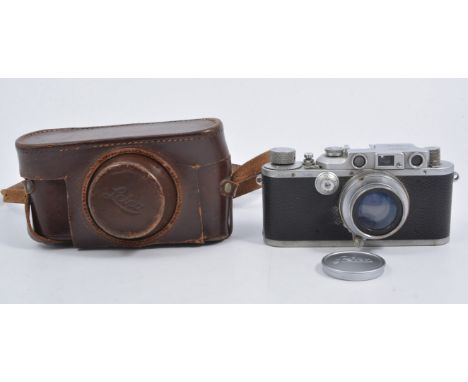 Leica IIIb Rangefinder camera with Ernst Leitz 35mm lens, reg no.323884, with branded leather case.Description amended 8.4.17