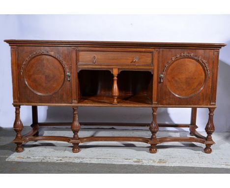 Edwardian mahogany sideboard, rectangular top with moulded edge, central frieze drawer above an open shelf with a baluster tu
