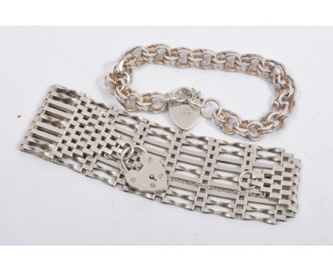 Two silver bracelets and a bangle, a nine row gate link bracelet with padlock fastener, a double curb link bracelet with padl