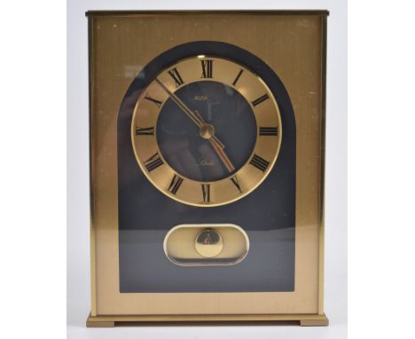 Avia brass cased mantel clock, with visible bobbin pendulum, 22cms.