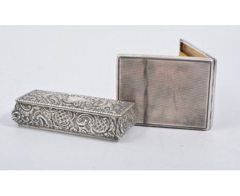 A Victorian rectangular silver trinket box, repousse chased with scrolls and flowers, gadroon edge border, hinged cover gilde