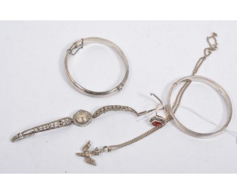 A hallmarked silver half engraved bangle and another similar stamped 925, a lady's ELO silver and marcasite cocktail watch ha