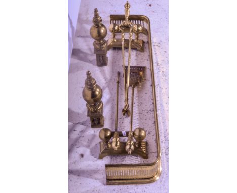 Louis XV style cast brass adjustable curb, incorporating swagged urn finials, width (as assembled) 97cm; a brass fender, andi