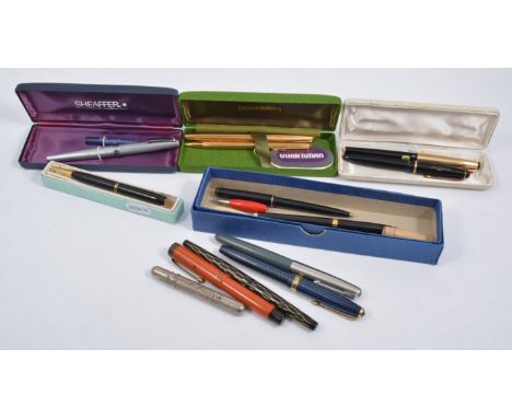 A collection of vintage fountain pens, a Mont Blanc 3.42.G fountain pen with a 14ct First Quality nib, a Waterman gold plated