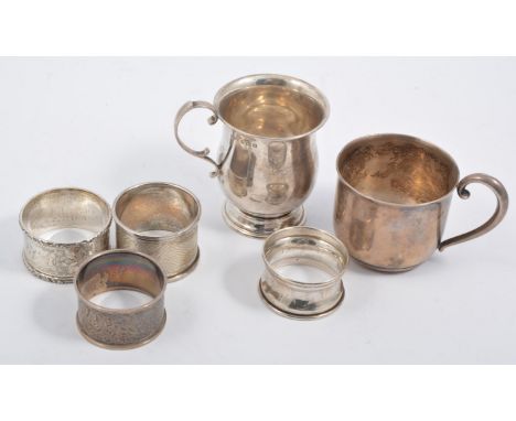 A small silver christening mug, 7.5cm high, hallmarked Birmingham 1929, approximate weight 1.5oz, another similar stamped Ste