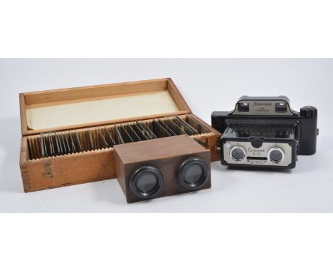Vintage stereo camera in cover, stereo slide viewer two wooden boxes with early 20th century glass stereo slides.