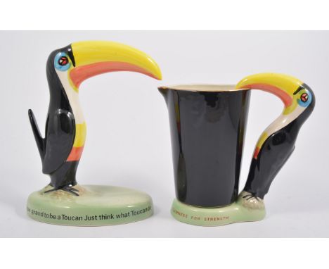 Carlton ware style advertising lamp with the Guinness Toucan, and another Guinness model, (2).