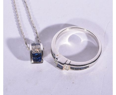 A sapphire and diamond suite of jewellery, a white metal ring stamped 750 channel set with two baguette cut diamonds and nine