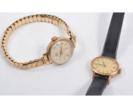 A ladies Tissot wrist watch, oval champagne baton dial in a 9 carat yellow gold case hallmarked London 1974, strap model, bac
