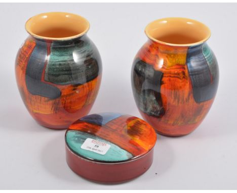 Poole Pottery two vases 17cm, 13cm; circular lidded box.