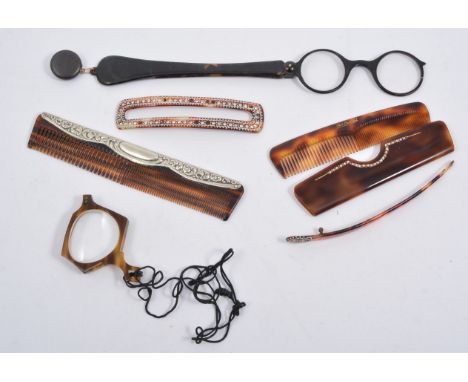 A faux tortoiseshell comb in case, spectacles, hair slide and another comb with plated top.