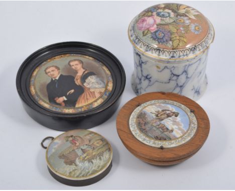 Prattware pot, 'The Seven Ages of Man', diameter 10cm; another Prattware pot and a small collection of pot lids, (7).