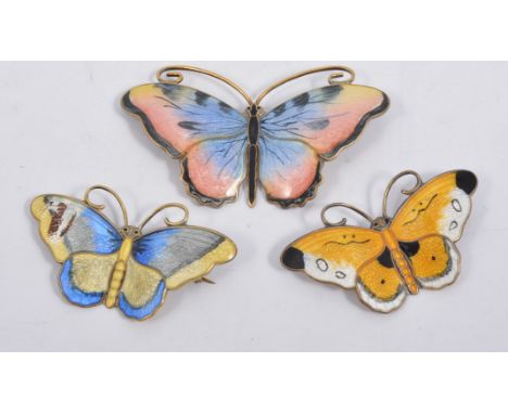 Three enamel butterfly brooches, marked Sterling Norway 925 with wing spans of pink and blue 65mm, yellow and black 50mm, blu