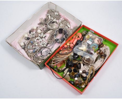 Two boxes of modern costume jewellery - polished white metal necklaces, bangles and bracelets, faux tortoiseshell and coral, 