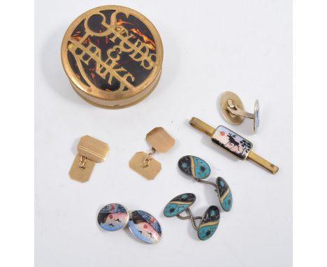 A faux tortoiseshell "Studs & Links" box containing two Scandinavian cufflinks, the four oval plates having guilloche enamel 