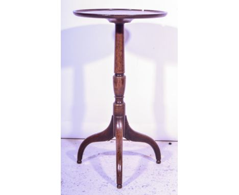 A Victorian mahogany pedestal wine table, circular top, tripod base, height 61cm.