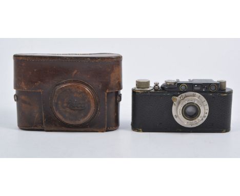 Leica II D Rangefinder camera c1932, black body with Leitz Elmar 35mm f3.5 lens, reg no.74645. In Leica branded leather case.