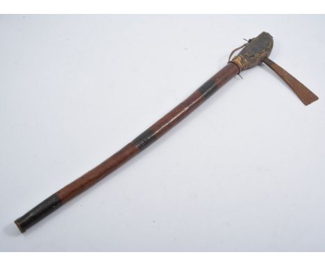 A Tomahawk axe with leather covered haft, the blade 13cm, overall length 61cm.