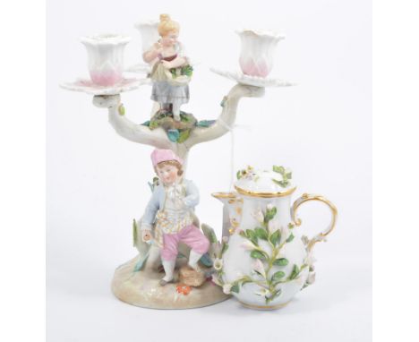 Meissen pear-shaped jug, encrusted floral decoration, 13cm; and a continental three-light candelabra, (2).
