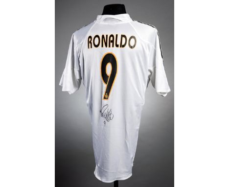 A Ronaldo [Luis Nazario de Lima] signed Real Madrid replica jersey,
signed in black marker pen to the reverse of the white ho