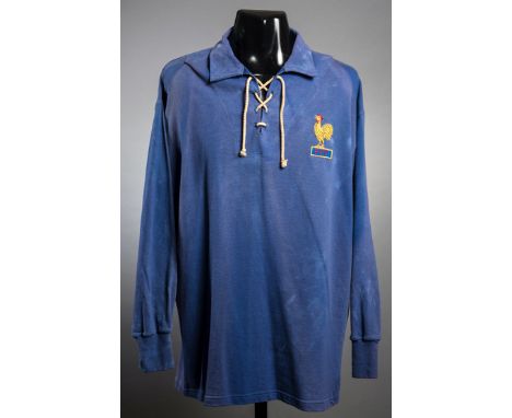 Raymond Kopa: a blue France No.9 international jersey circa 1952,
long-sleeved; sold with a French football magazine featurin